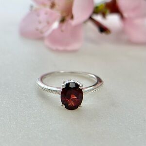 Classic Oval-Cut Garnet Solitaire Ring in Platinum-Plated Sterling Silver Size 6